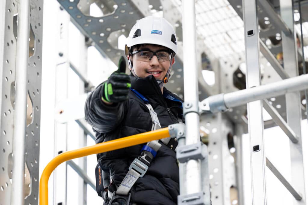 Centura College Wind Turbine Technician Student Giving a Thumbs Up