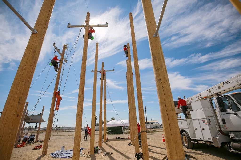 Centura College electrical lineworker program students working outdoors