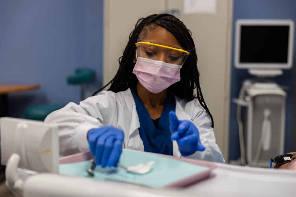 Centura College dental assistant student practicing chairside skills